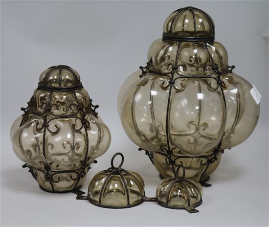 Two iron mounted dimple glass ceiling chandeliers